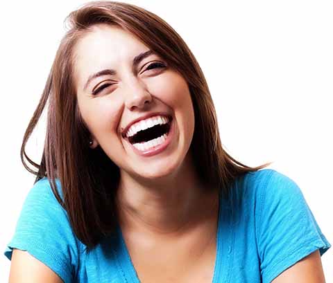 teeth whitening colorado springs - laughing young woman with bright white smile